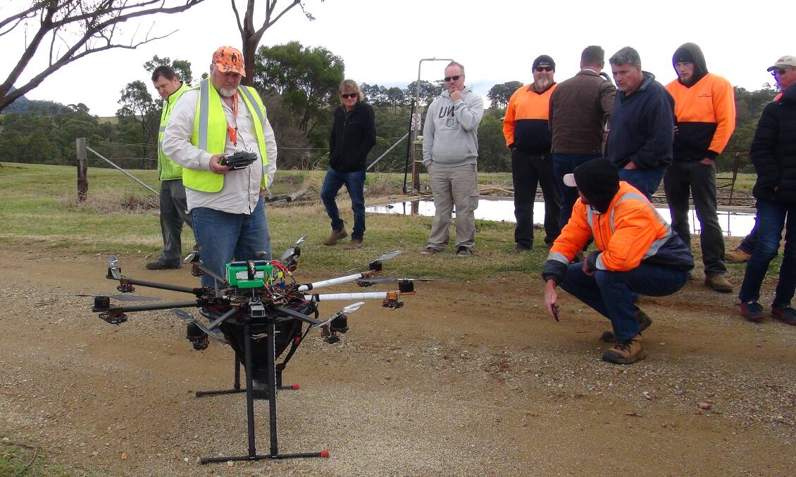 Doing things with drones: Nathan Roy from Aerobugs with a giant drone which releases beneficial predatory insects into targeted areas of the vineyards to manage pest insects, during a workshop in the Hunter. Photo: Bernadette York.
