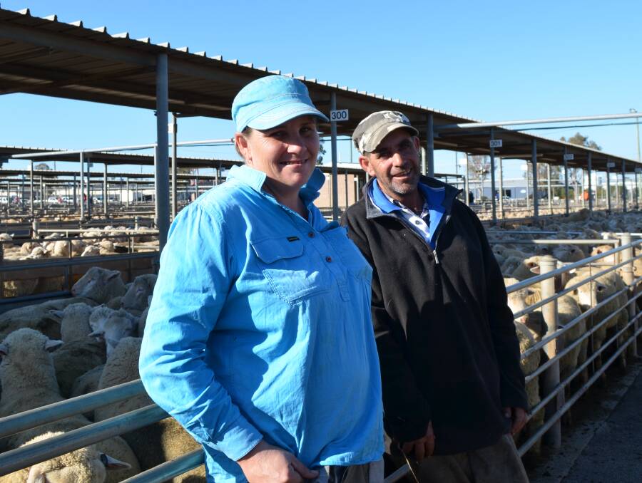 SALE DAY: Siblings Kelly and Kevin Hopkins are pictured at the Wagga sheep and lamb sale on Thursday. Picture: Nikki Reynolds 