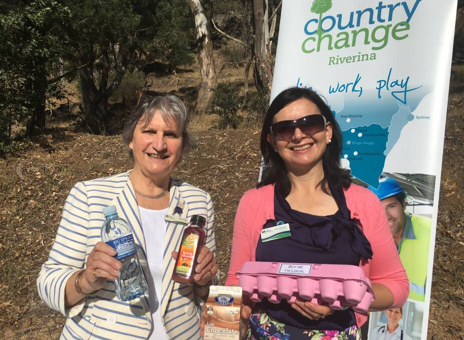 RIVERINA PRODUCE: Diana Gibbs and Rachel Whiting from RDA Riverina showcasing local Riverina produce on National Agriculture Day. 