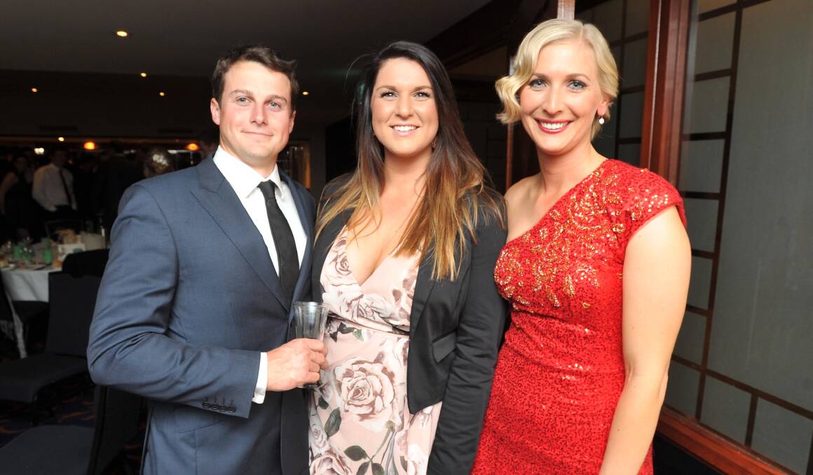 CELEBRATING ALL THINGS RURAL: Jeremy Cobb, Carly Fabris and Georgina O'Neill are pictured at the ShowAll Rural ball in 2015. 