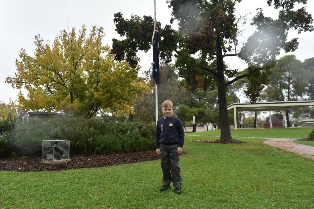 SERVICE MOVES INDOORS: Fergus Meyer, 5, prepares to attend the Anzac Day service at Henty. Picture: Lorri Roden