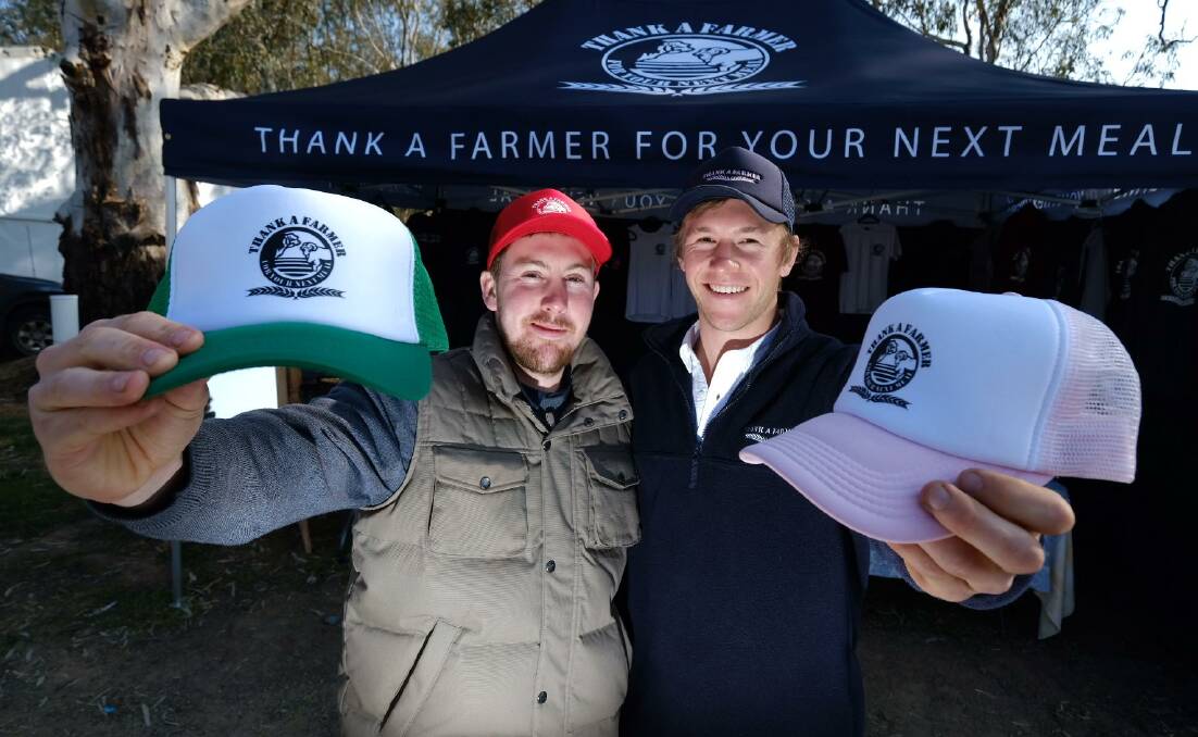 HATS OFF TO SOCIAL MEDIA:  Co-creators of Thank a Farmer for Your Next Meal, Jim Honner, Harden, and Sam Johnston, Forbes, at the Henty Machinery Field Days. 