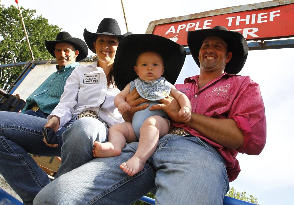 Teneille Little and Cody Angland with their six-month-old son Rowdy, and Phil Angland on the left of photo. Picture: Les Smith 