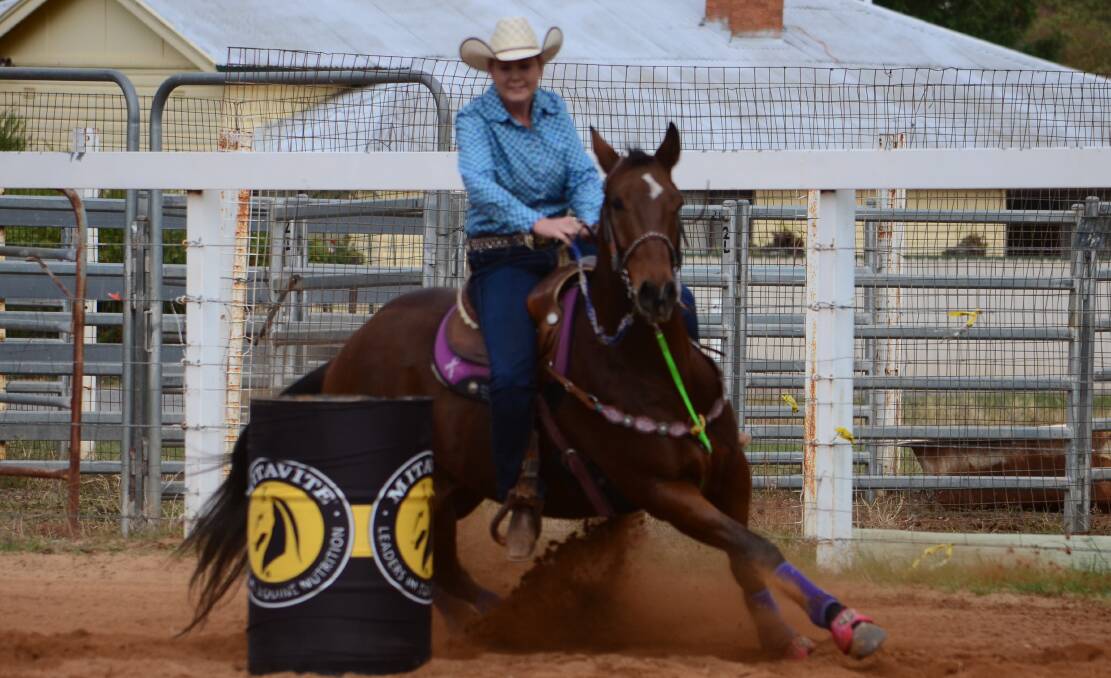 RUNNING HARD: Hayley King of Wagga rides Tyrone Boom in the divisional Australian Barrel Horse Association event at Grong Grong.