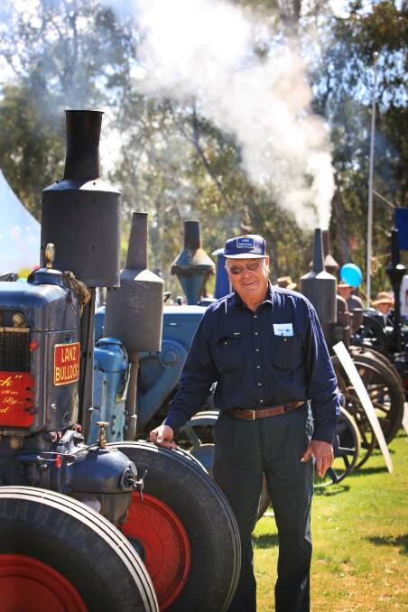 A REAL FAVOURITE: Len Schilg has been displaying a perennial crowd favourite, the Lanz Bulldog tractor, for many years at Henty.
