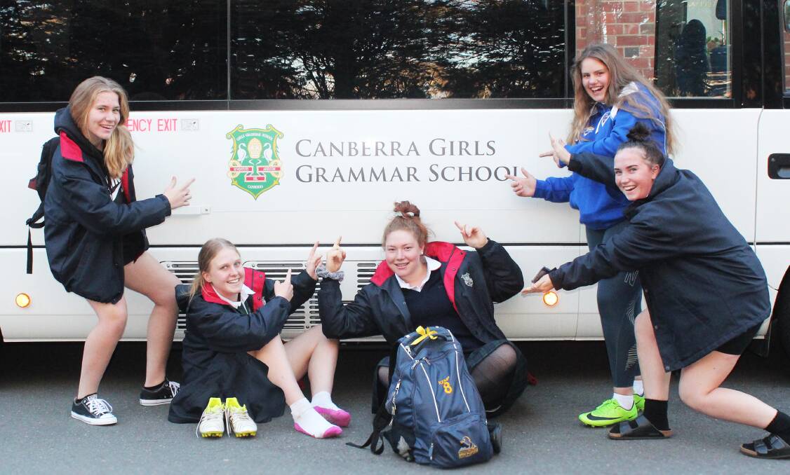 BOARDERS (from left) Macaela Rowe (year 11), Skye Pennington (year 11), Grace Kemp (year 11), Sarah Walker (year 10) and Lucy Burgess (year 11) show off the new bus.