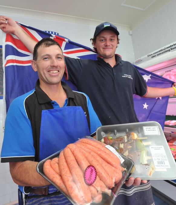 MEATY BUSINESS: Tolland Meat Centre's Andrew Nelson and Dusty Rogers prepare for one of their busiest times of the year - Australia Day. Picture: Laura Hardwick