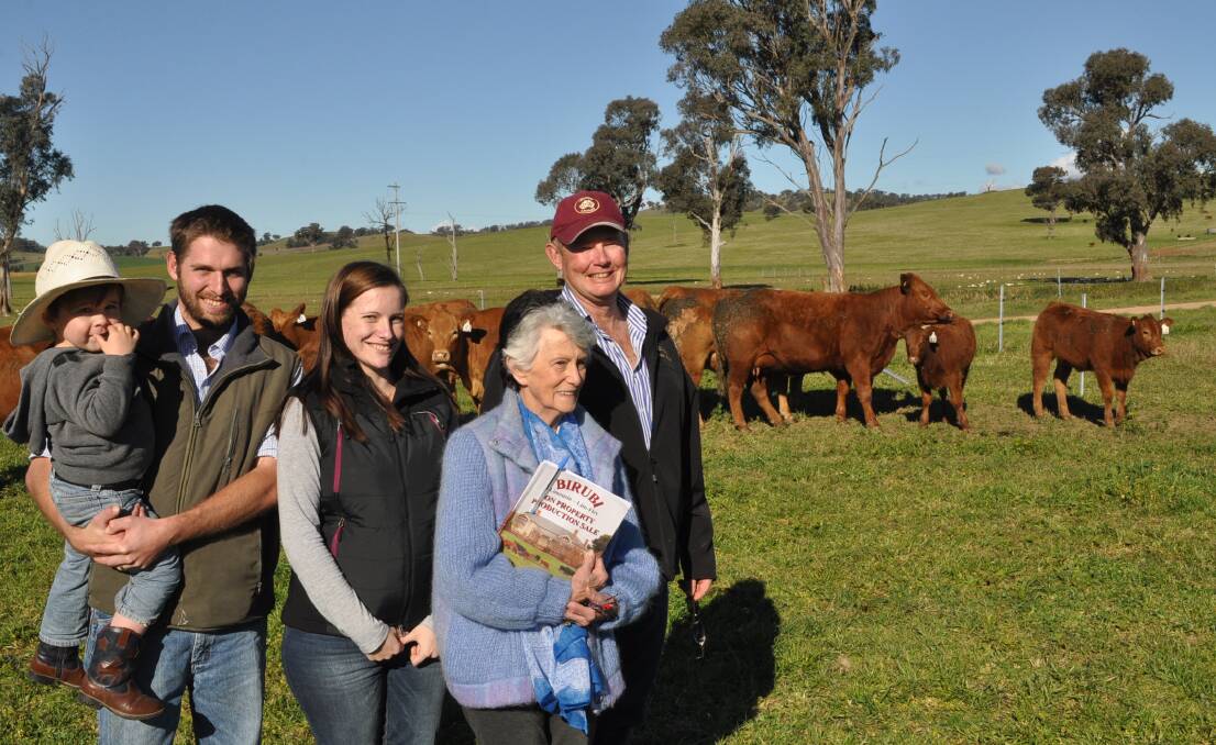 James and Amy Edwards, Breakaway Limousin stud, Geurie, with their son Justin, 3, and stud principal and manager Annette Tynan and Glen Trout, Birubi Limousin and Lim-Flex stud, Wagga. Picture: Brett Tindal