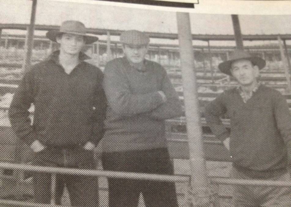 JUNE 1993: John and Geoff Lane from Galore with Neil Bahr from Henty (centre) just sold Corriedale trade weights for $39 at the Wagga sheep sale.