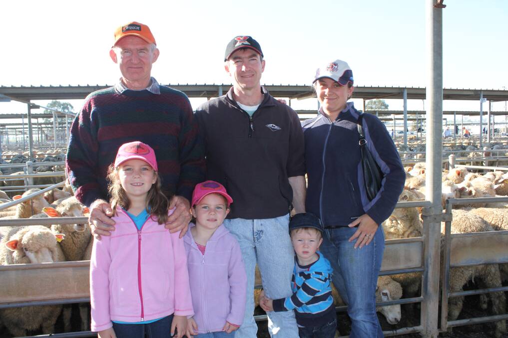 Greg Plum with his son Andrew Plum and Martha Plum and grandchildren Hayley Plum, Rachael Plum and Aiden Plum all of Lady Smith at the Wagga sheep sale. 
