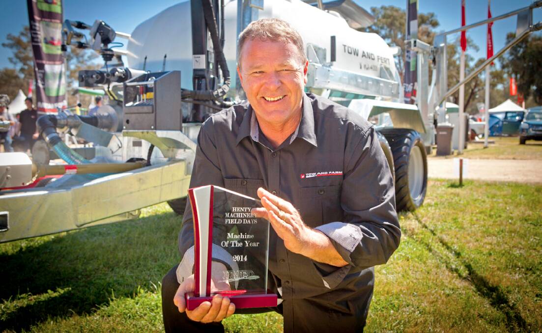 Neil Parker, Tow and Farm, with his 2014 machine of the year award.