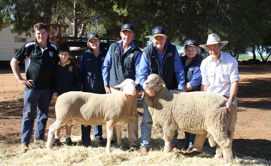 Trent and Zak Gooden from Lockhart bought the top-priced Suffolk Ram for  $1900. The ram is pictured with Almondvale principals Dalles, Paul, Peter and Martia Routley and fellow ram buyer Laurie Beer from Deniliquin who secured the top-priced Bond for $2000. 
