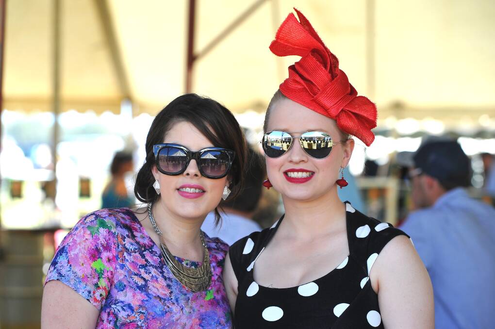 Georgia Bremner from Ardlethan and Alana Hartwig from Temora at the Ardlethan Picnic Races in 2013. 