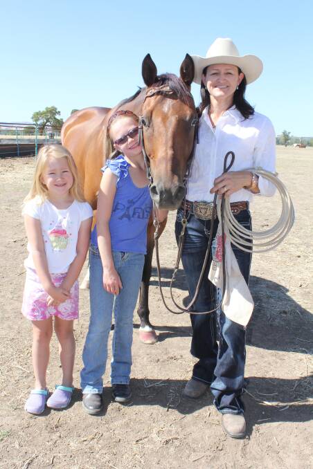 Darnah, 6, Isobella, 9, and their mum Michelle Makeham, "Willow Mead" Nangus with horse Chubby after returning from the ABCRA rodeo finals in Tamworth.