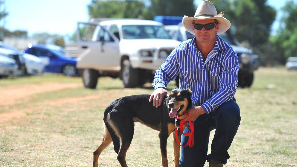  Andrew Kennedy sold his dog Kennedy’s Boots  at the dog auction at Downside for a record price of $8600. Picture: Addison Hamilton
