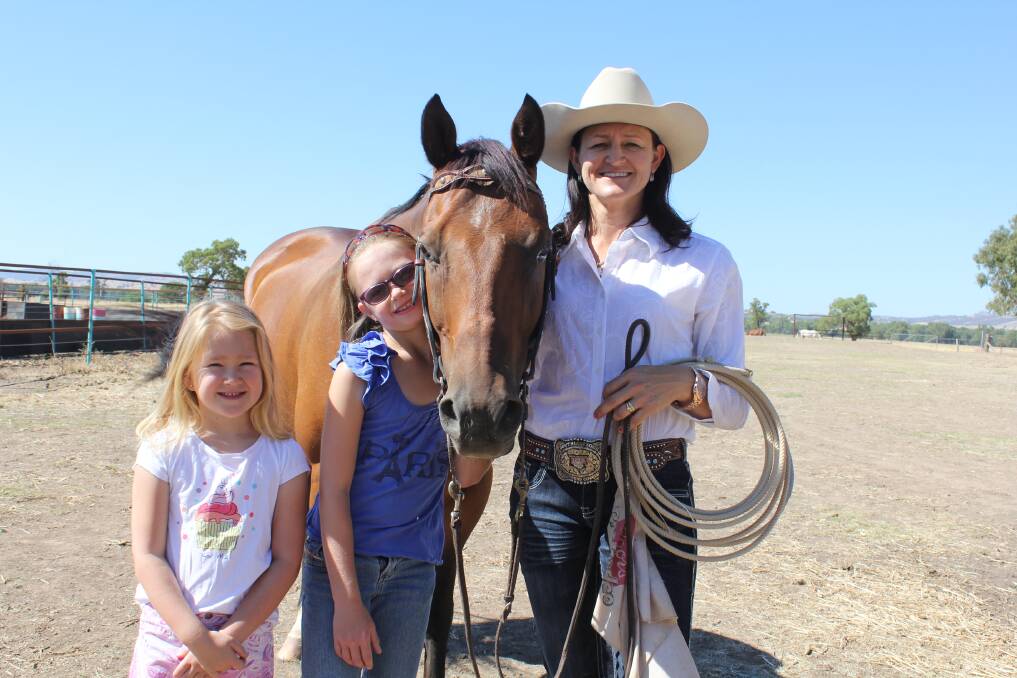 Darnah, 6, Isobella, 9, and their mum Michelle Makeham, "Willow Mead" Nangus with horse Chubby after returning from the ABCRA rodeo finals in Tamworth.