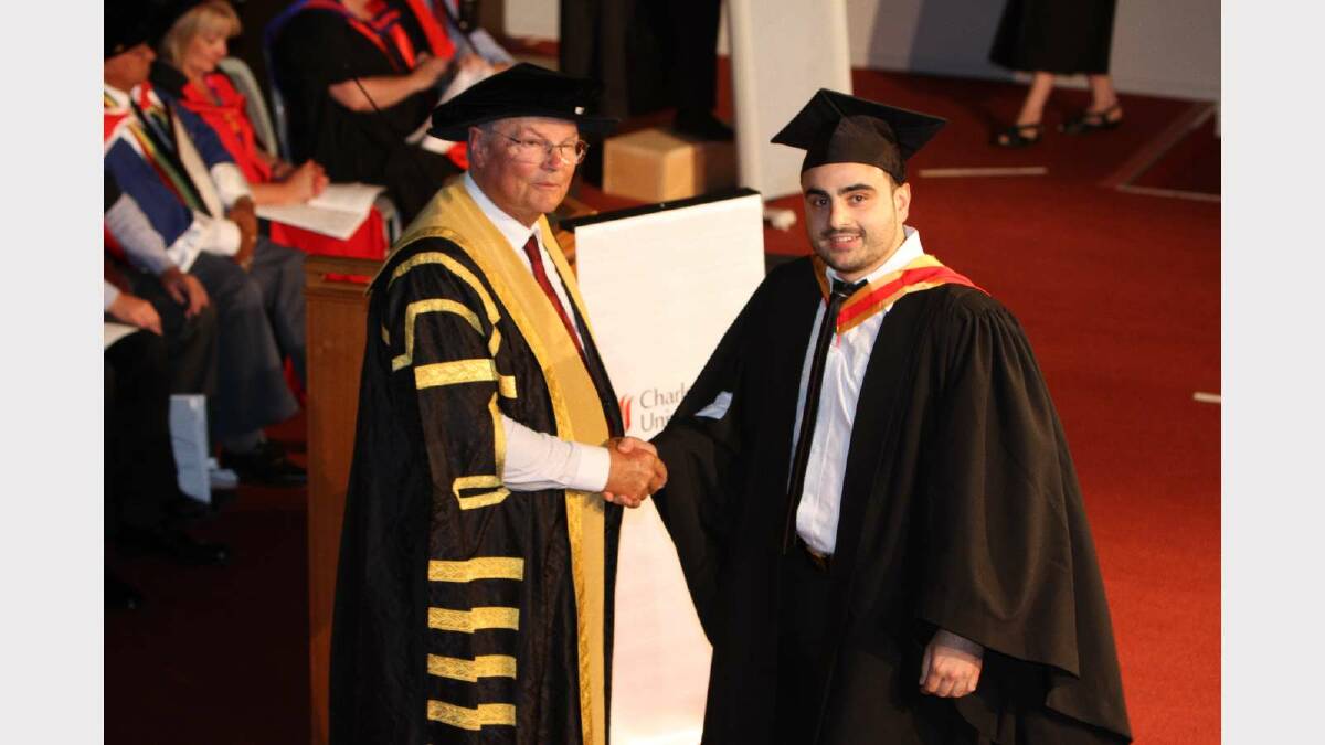 Graduating from Charles Sturt University with a Bachelor of Science is Patrick Akele. Picture: Daisy Huntly
