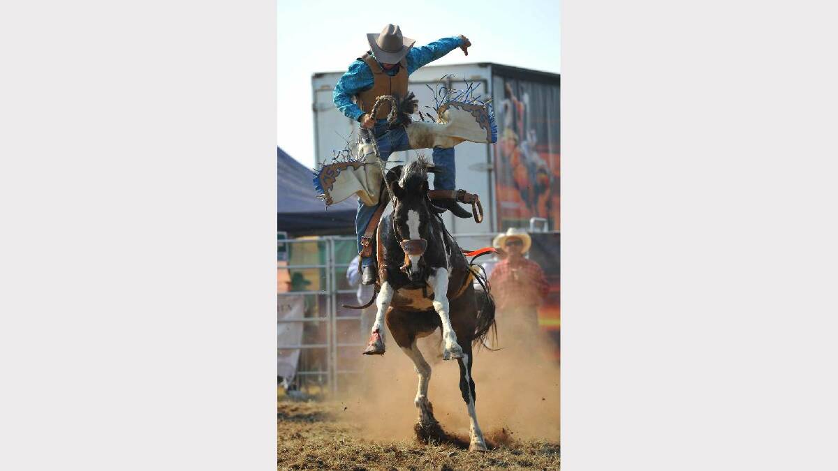 COOLAMON RODEO: Scott Waterson gets airborne in the second division bronc ride. Picture: Addison Hamilton