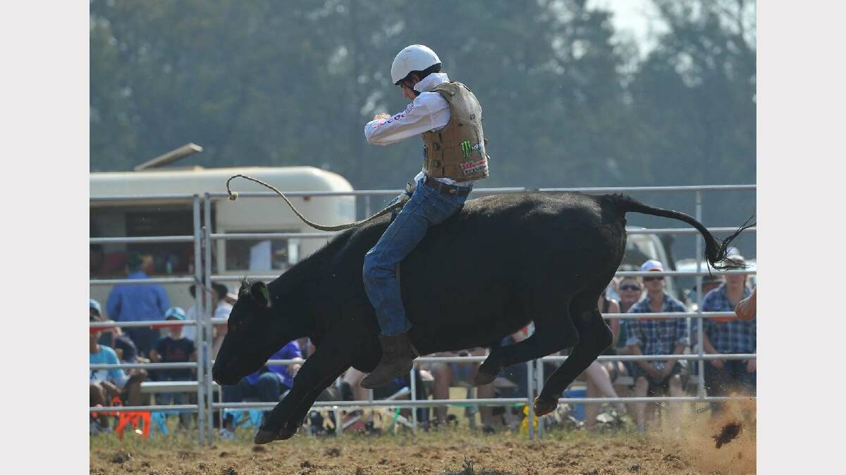 COOLAMON RODEO: Toby Commins holds on for dear life in the under 18s section. Picture: Addison Hamilton