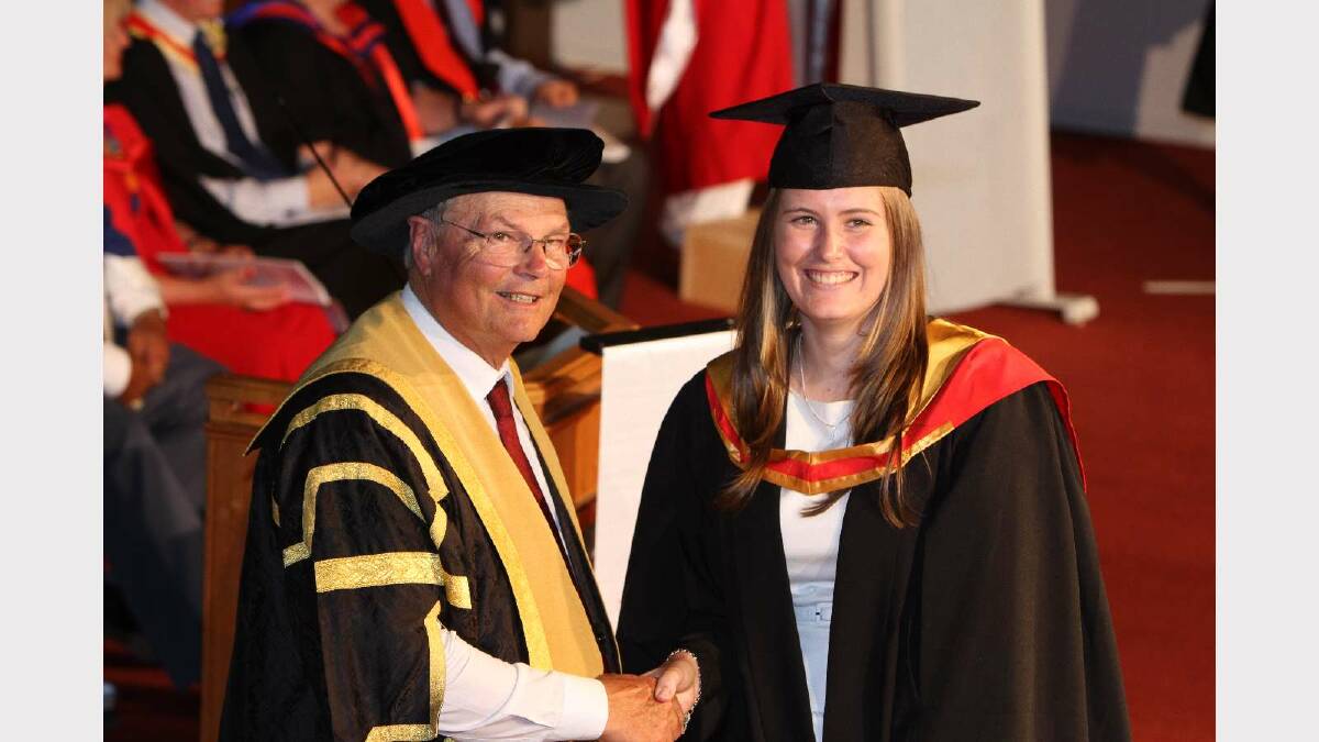 Graduating from Charles Sturt University with a Bachelor of Animal Science (Honours), with Honours Class 2 Division 1 and Haylee Edwards. Picture: Daisy Huntly