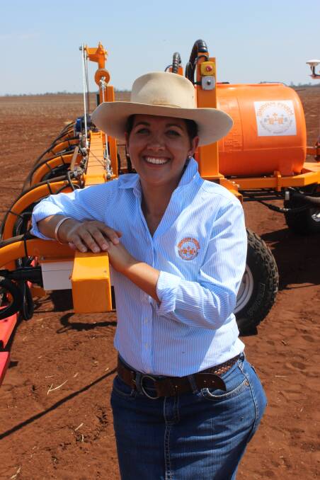 SwarmFarm co-founder and director, Jocelyn Bate "Bendee" Gindie, Queensland with a SwarmBot