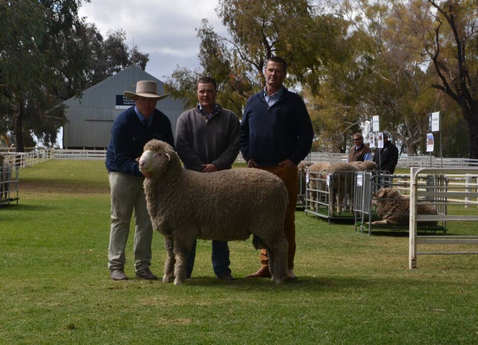 With the top priced Poll Boonoke ram at $46,000 - Angus Munro, Poll Boonoke stud, Conargo, with purchasers Brett and Nigel Kerin, Kerin Poll Merinos, Yeoval.