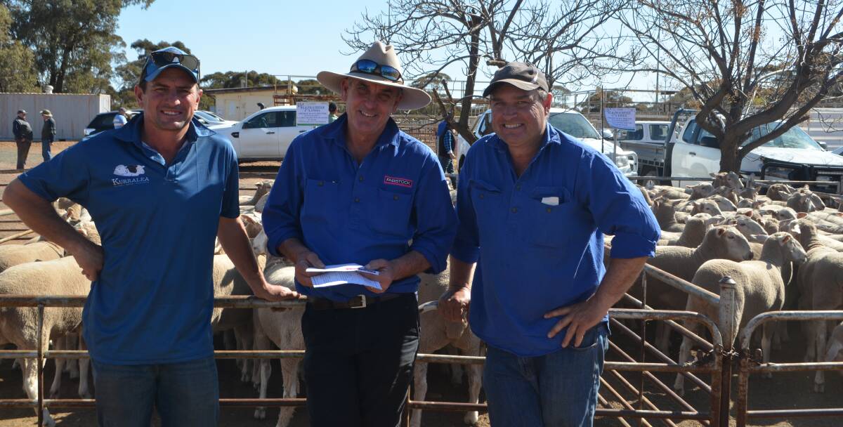 Best presented pen and top priced pen: judge Ben Prentice, Kurralea studs, Ariah Park with Steve Gates, Fabstock, Wagga Wagga presenting cheques to Matt O'Dwyer, Ariah Park who bred the top pen of ewes sponsored by Connolly Pregnancy Scanning and Fabstock.