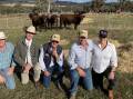DEMAND: The $60,000 top-priced Shorthorn bull with Jeff Schuller, auctioneer Paul Dooley, vendor Gerald Spry and Greg and Megan Schuller, Outback Shorthorns, Culcairn. 