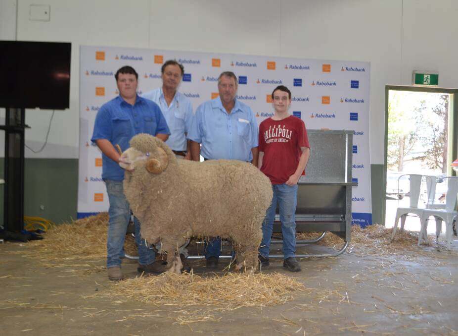 William Glen, George Merriman, Merryville, Boorowa with buyer Ian Glen and son Lachlan, Guildford, Victoria with equal top priced ram. Mr Glen thought the ram might have made ten to $15,000 and was impressed by the value throughout the sale.
