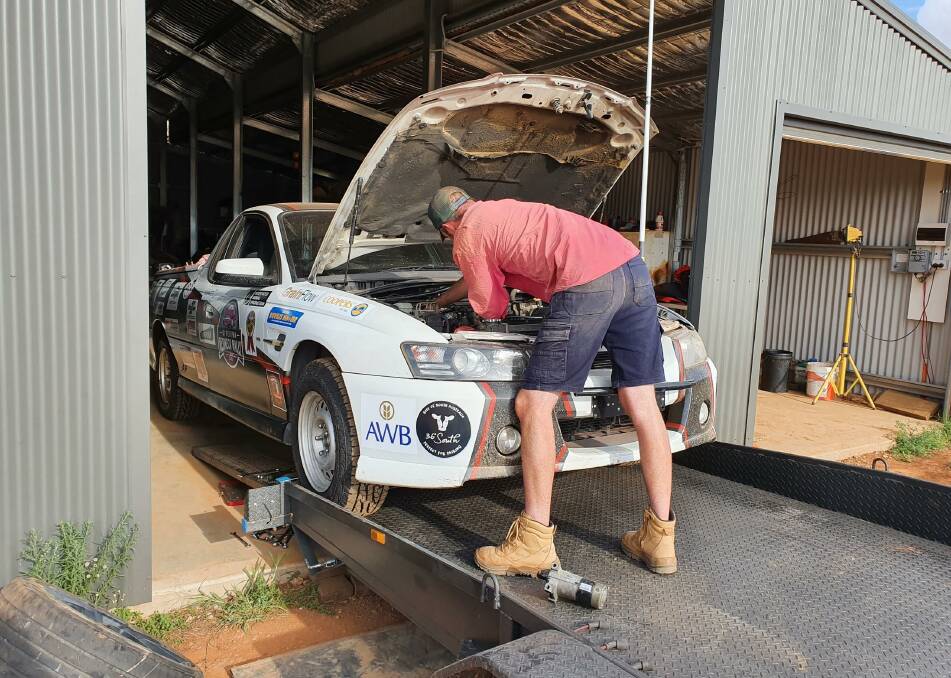 One of the cars from Coolamon going through the last minute service check. Photo: Shane Bullock