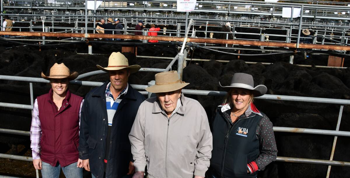 Warren Falder, Amarina Angus, Mt Horeb via Adelong, with his son Brett and granddaughters Ellie and Emma with their annual draft of Innesdale-blood Angus weaners. Their top pen of 75 weighing 372kg and eight to ten months sold for $2020. 