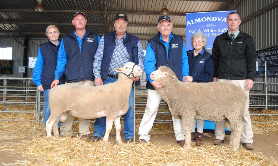 BREEDING STRENGTH: Dalles and Paul Routley, Randyn Fischer buyer of the top-priced White Suffolks, Peter and Marita Routley and Peter Godbolt of Landmark Albury. Picture: Shantelle Stephens 