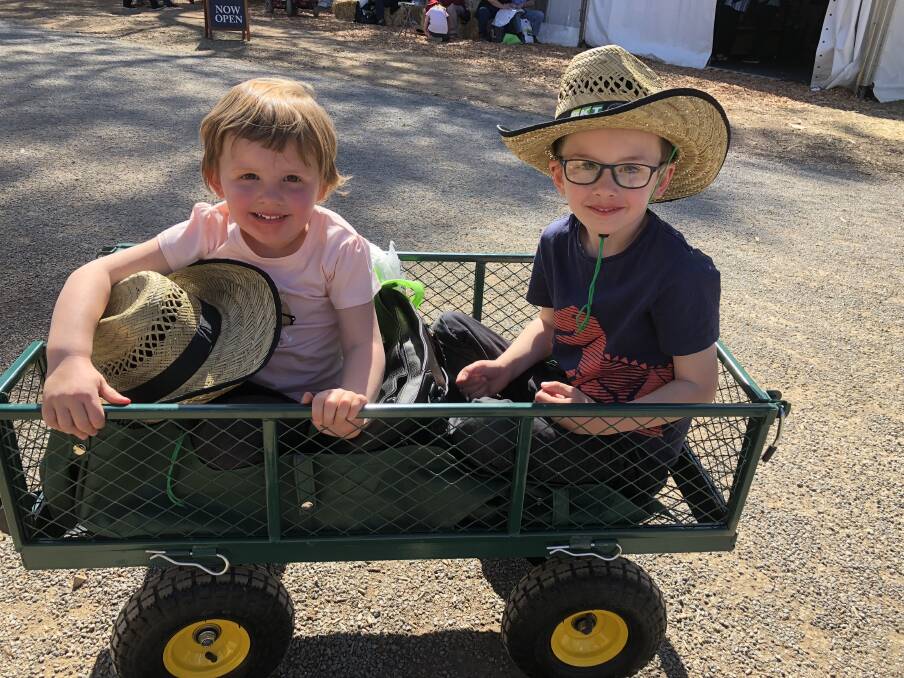 GOT WHEELS: Siblings Alex, 5, and Maddie, 3 Chryssochoides of Wagga at Henty Machinery Field Days. Picture: Nikki Reynolds 