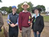 LOOKING BACK: From the 2019 archives, sheep over-judges Peter Twomey, Wagga Wagga and Geoff Land, Galore with Wagga Show Society Steward, Tahlia Bruce, Sandigo. 