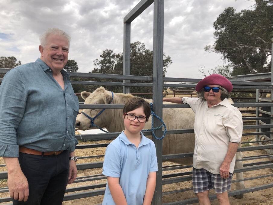RURAL GESTURE: Wagga RSL chief executive officer Andrew Bell, Willans Hill School pupil, Luca Soaronne, 10 and cattle breeder Georgette Keen, Nawarra Murray Greys. 