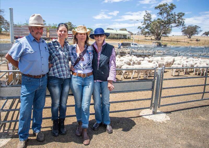 DISPERSAL: Delta sold about 1000 head of Australian White ewes and lambs on behalf of the Estate of Tony Martin, Yass. Pictured is Tony's good friend Ken White, Sonia Slattery (buyer) "Kelmont Park", with Tony's daughter Kylie and wife Jenny all of Yass. Sonia bought 139 ewe lambs for $185. Picture: Supplied