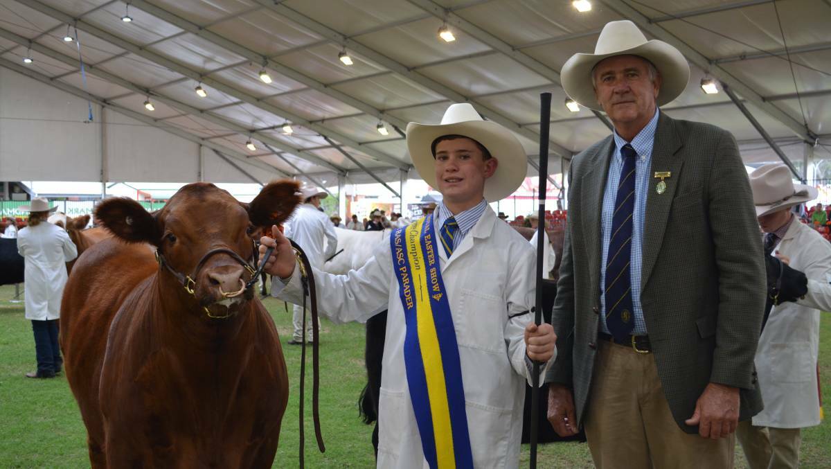 LOOKING BACK: Reserve champion RAS/ASC beef cattle parader Hamish Maclure, Tarcutta, with ASC vice-president Tim Capp, at the 2018 Sydney Royal Show. 