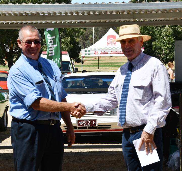 LOOKING BACK: Henty Show Society president, Warren Dale and Bruce Taylor of Henty are pictured at the show last year. Picture: Lorri Roden