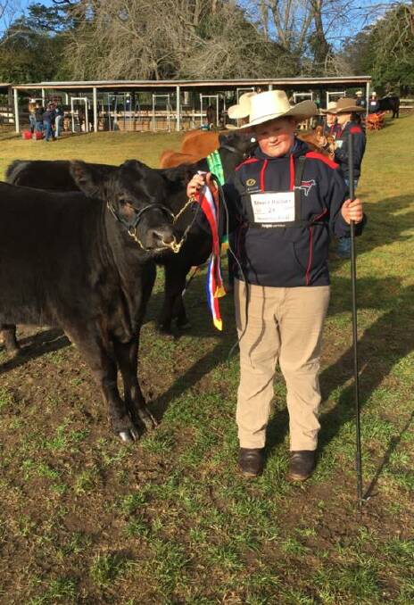 PROUD MOMENT: Edward Maclure winning the owned and bred class at the recent Limousin Youth Camp. Picture: Supplied