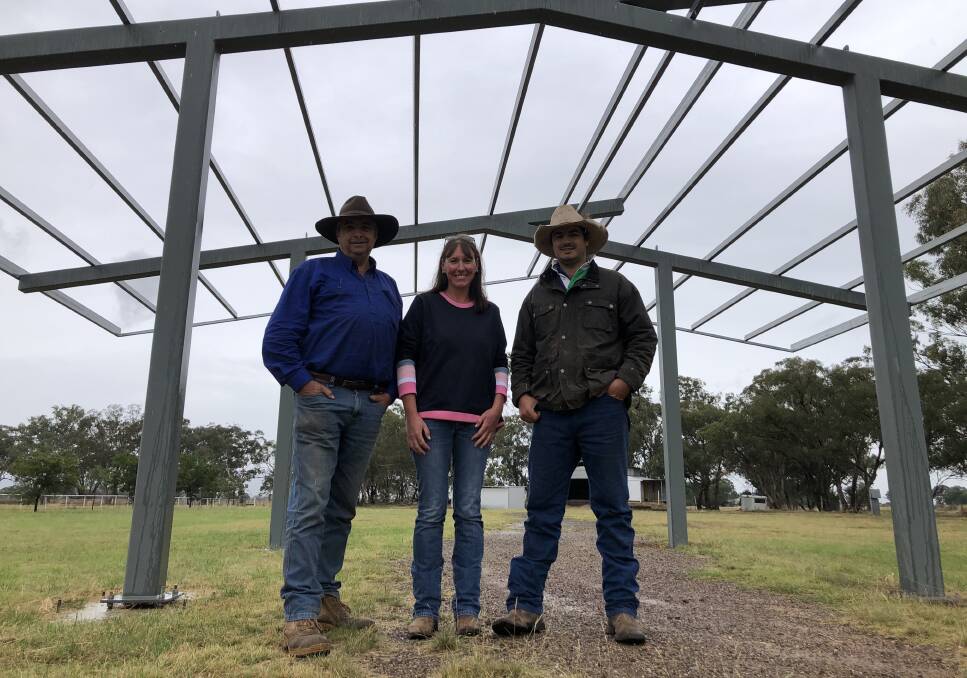STRUCTURE: This will ultimately become the bar at Illabo Showground and is pictured with Bill Muller, Nicole Hopkins and Simon Muller. Picture: Nikki Reynolds