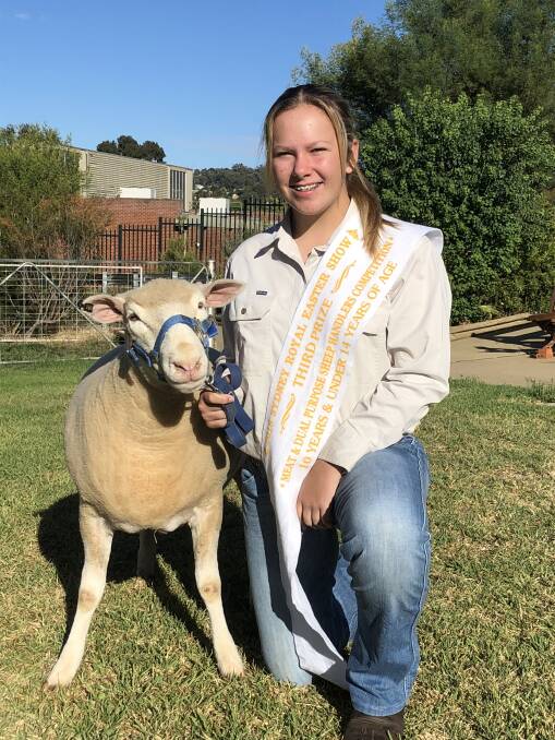 TREASURING ROYAL SUCCESS: Kooringal High School student, Kayla Horne, 13, placed in the junior handling competition at the Sydney Royal Easter Show. Picture: Nikki Reynolds 
