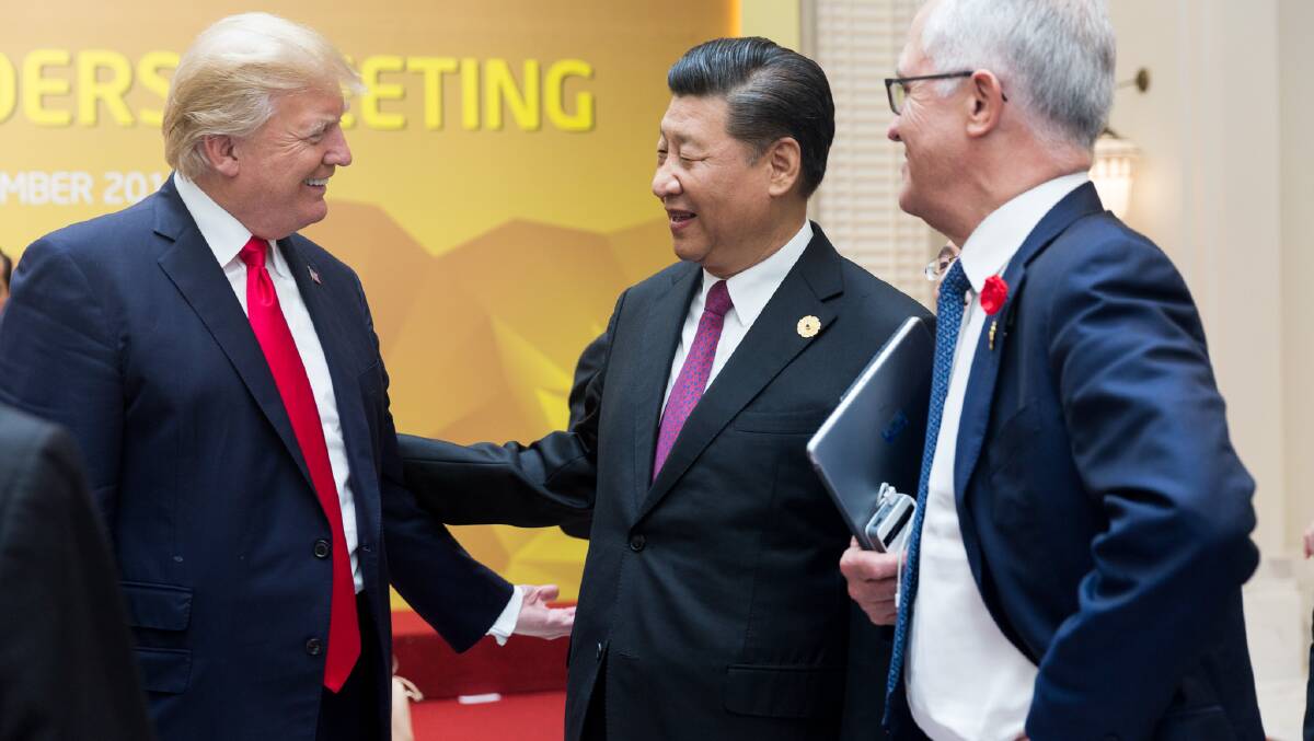 Then US president Donald Trump with Chinese President Xi Jinping, and then Australian prime minister Malcolm Turnbull at APEC in 2017. Picture US White House
