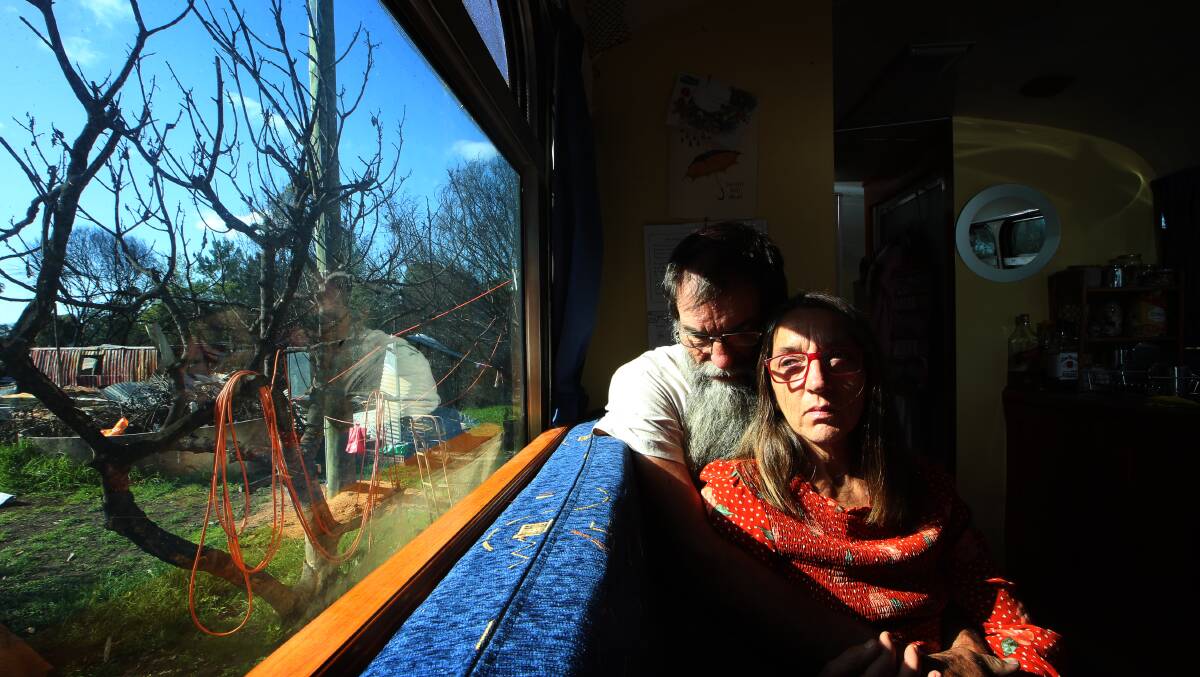Murray Gibbs and Veronica Coen live in a bus beside the ruins of their Quaama home. Photos: Sylvia Liber 