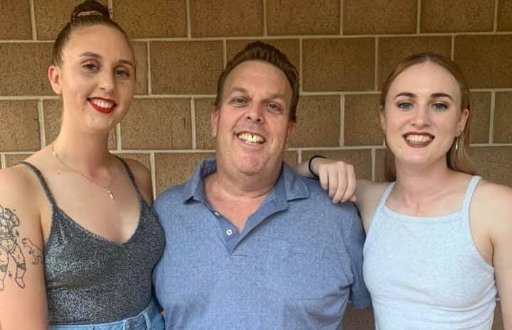 Charlotte and Sarah-Jane Brown with their dad Eric, who sadly passed away on August 14. The sisters were unable to attend their father's funeral on August 31, as they were refused entry into Queensland. Photo: supplied