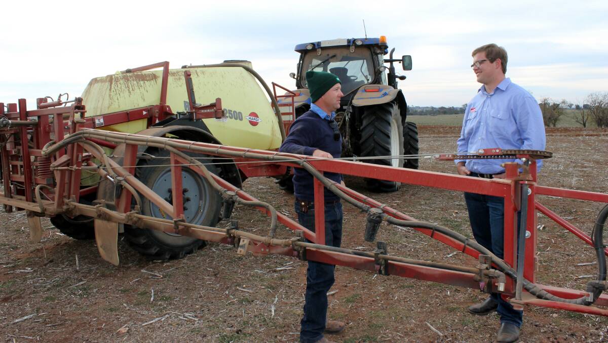 VICCHEM territory manager for NSW Jeshua Smith (right) speaks with farmer Mick Reynolds of ‘Toompang’, Young.