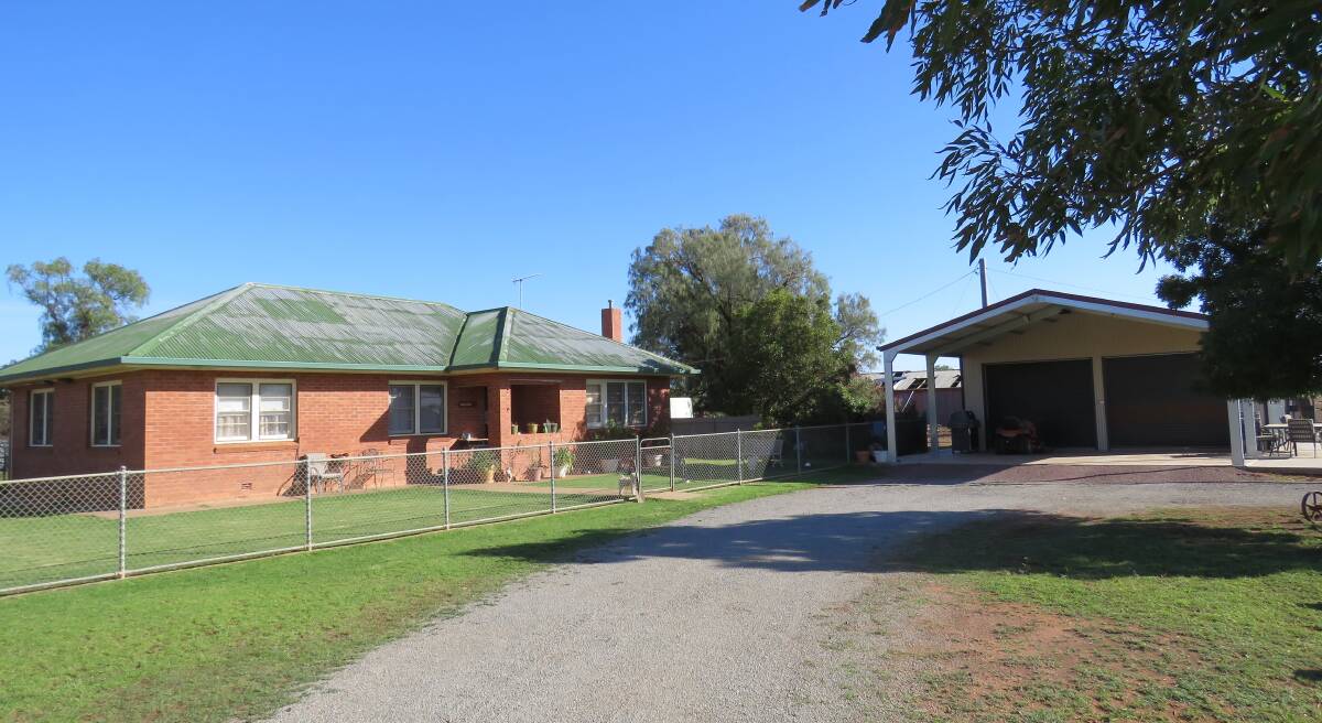 'HILLVIEW': The three-bedroom home on the property features a new double garage with carport frontage. The properties will be auctioned on June 8 at 2.30pm at the Barellan War Memorial Club.