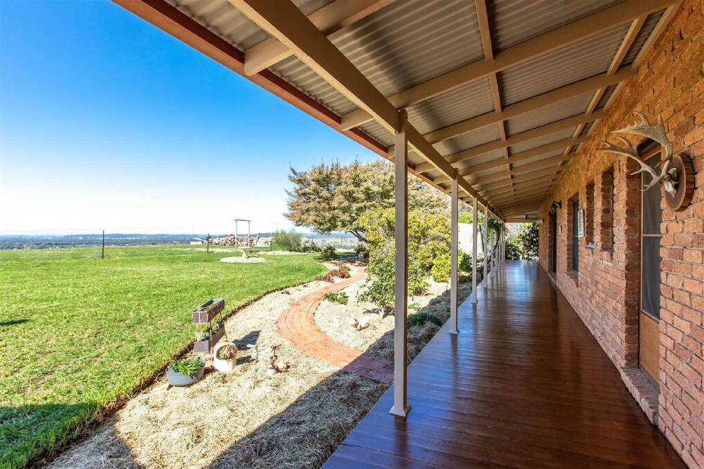 Perfect: The home is brick with a wide timber verandah.