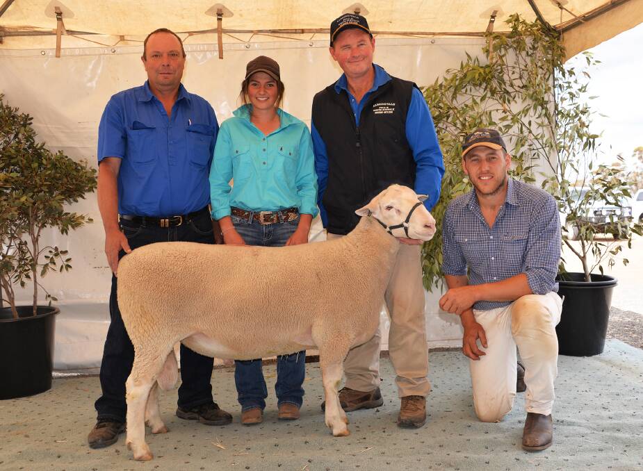 THE top-priced ram was 160061, purchased by (from left) Randyn and Helena Fischer (Clive stud), and Paul Routley (Almondvale stud), with Anden co-principal Joel Donnan.