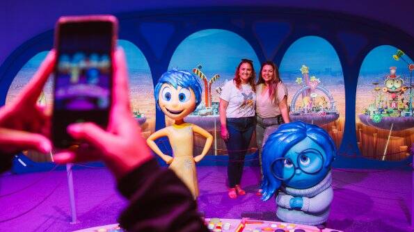 Exhibition goers in Spain pose inside the life-size replica of Inside Out's mind headquarters. Picture via Proactiv Entertainment.