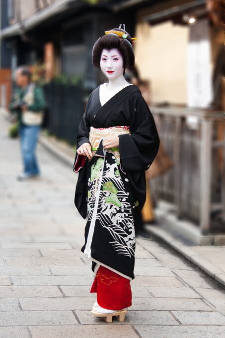 A geisha in Kyoto with a special kimono for the day of her erikae. Picture: Shutterstock